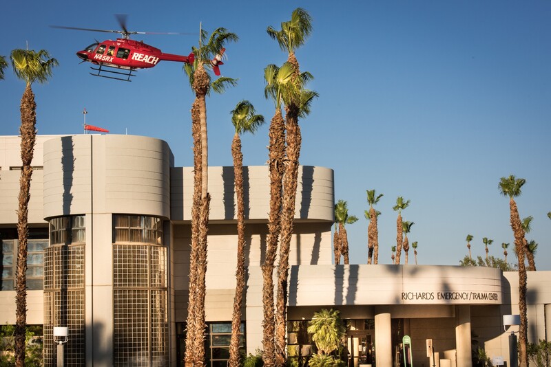 External western view of Desert Regional Medical Center as a helicopter lands on the rooftop. Staff Photo