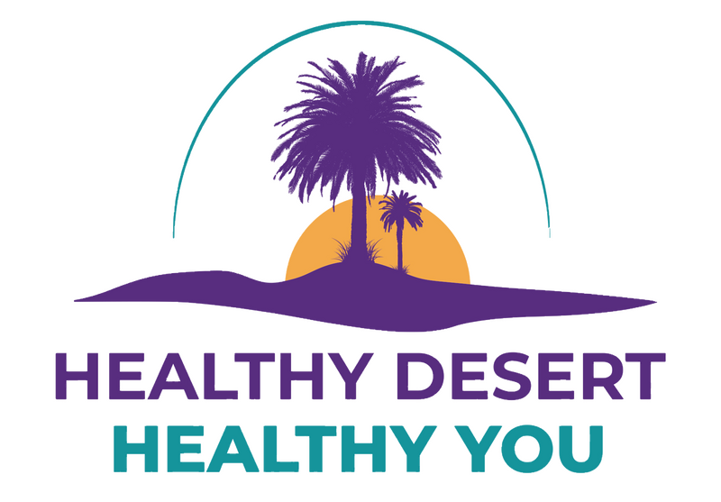 Summit logo consists of one large and one small purple palm tree on a mound of purple sand with a large half-sun setting behind them. There's a teal half-arc above the trees, with the words "Healthy Desert Healthy You" in two lines under the image. First text line is purple; the second is teal.